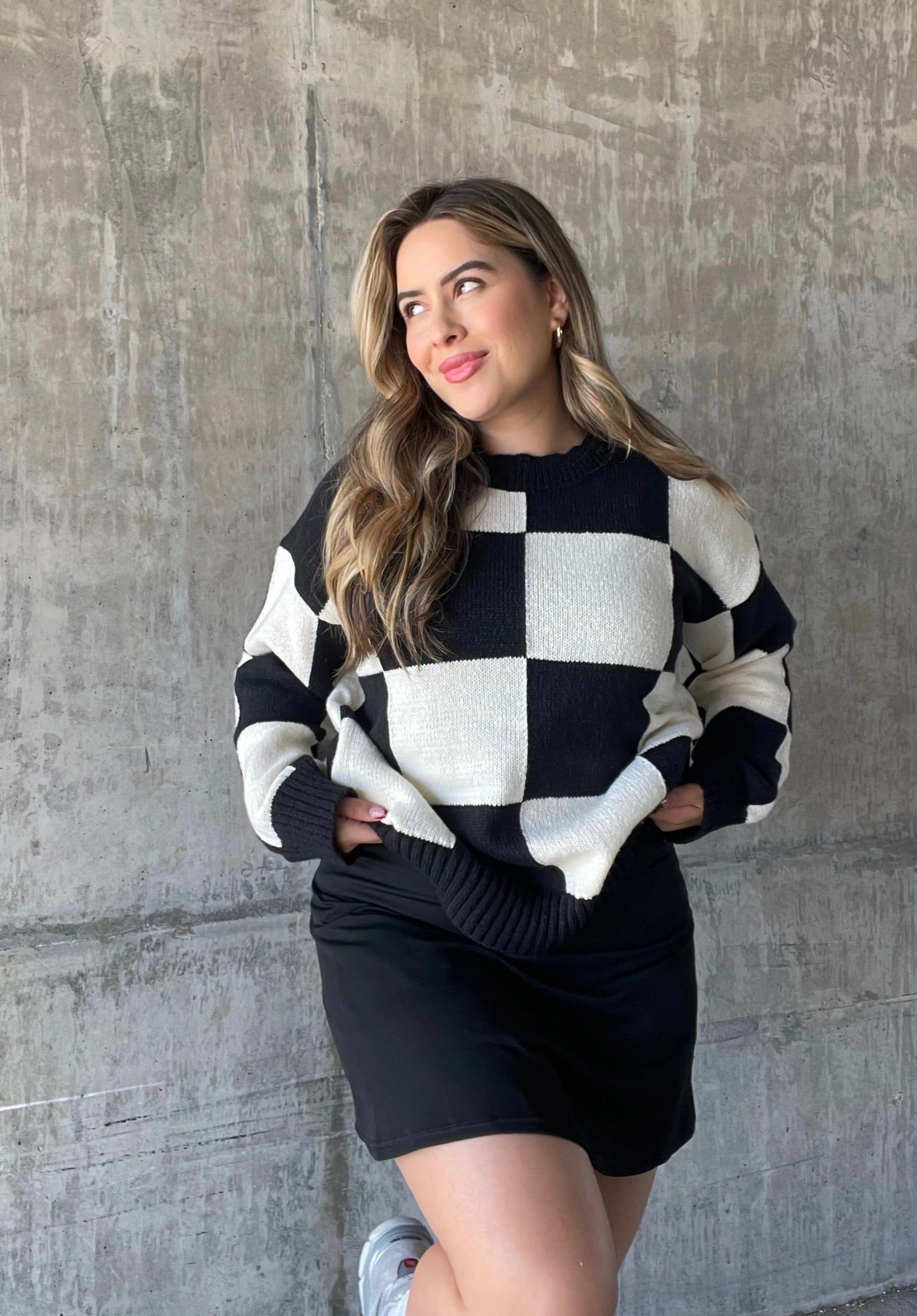 Black and white checkered sweater