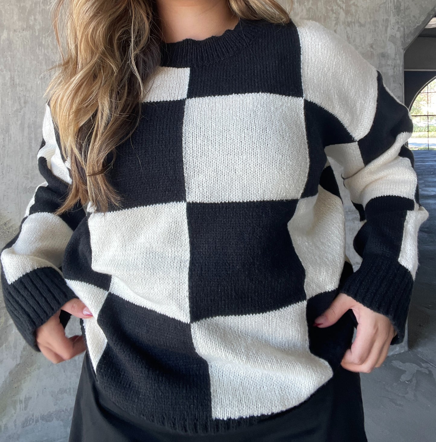 black and white checkered pull over 